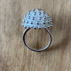 Make a statement with this size 7 Sterling Silver ring!